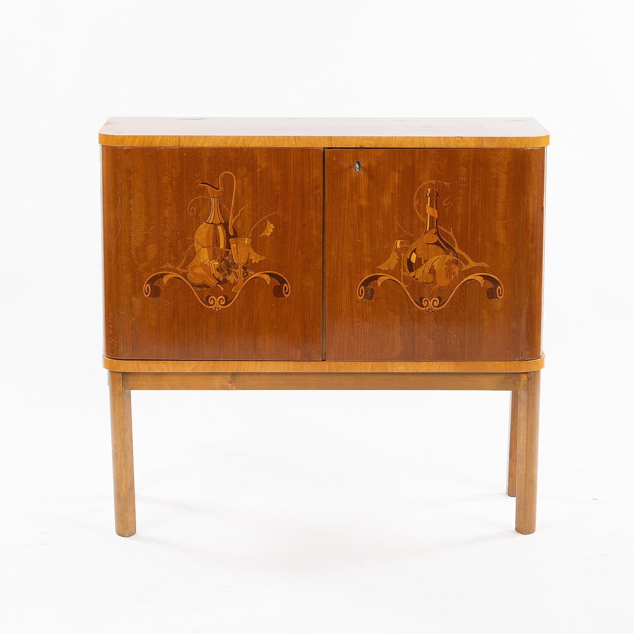 A 1940s/50s intarsia bar cabinet.