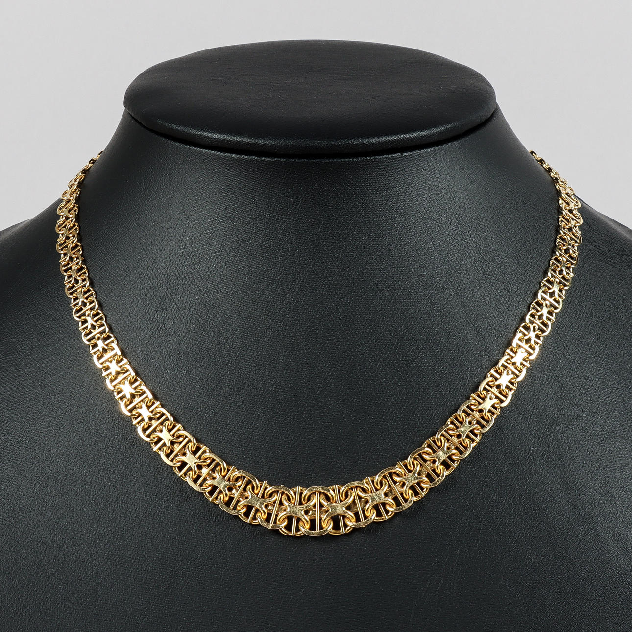 COLLIER, X-länk med stav, 18k guld, doserat.