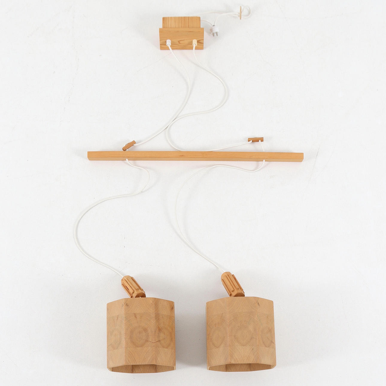 A 1970s pine ceiling lamp.