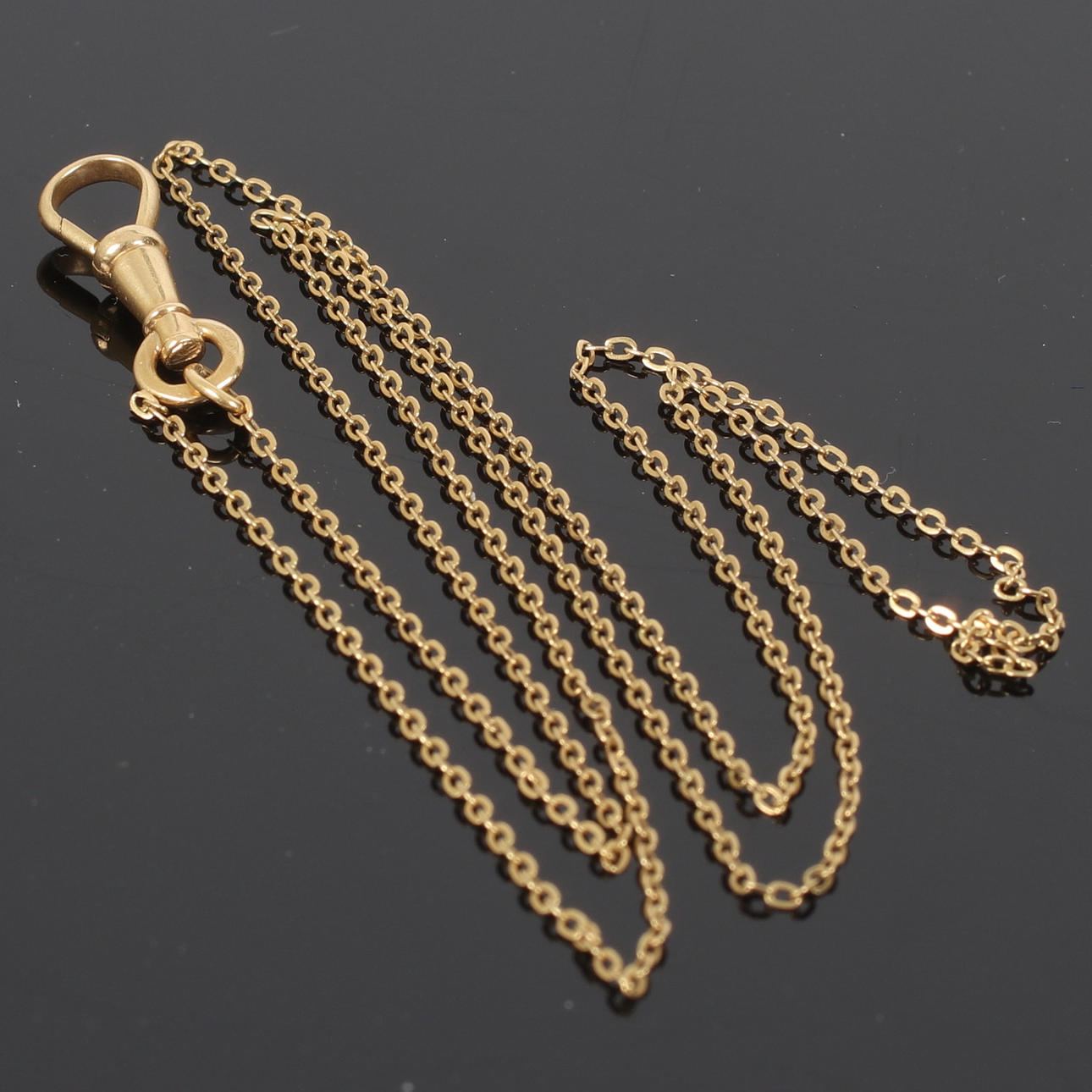 KLOCKKEDJA, 18k guld, 1900-tal.