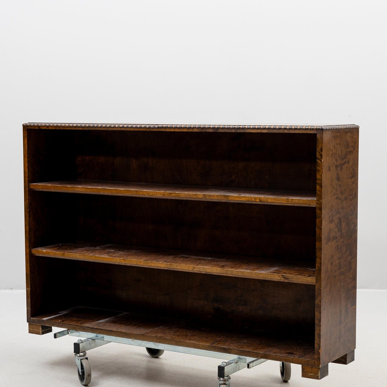 A 1930s boned wood bookcase.