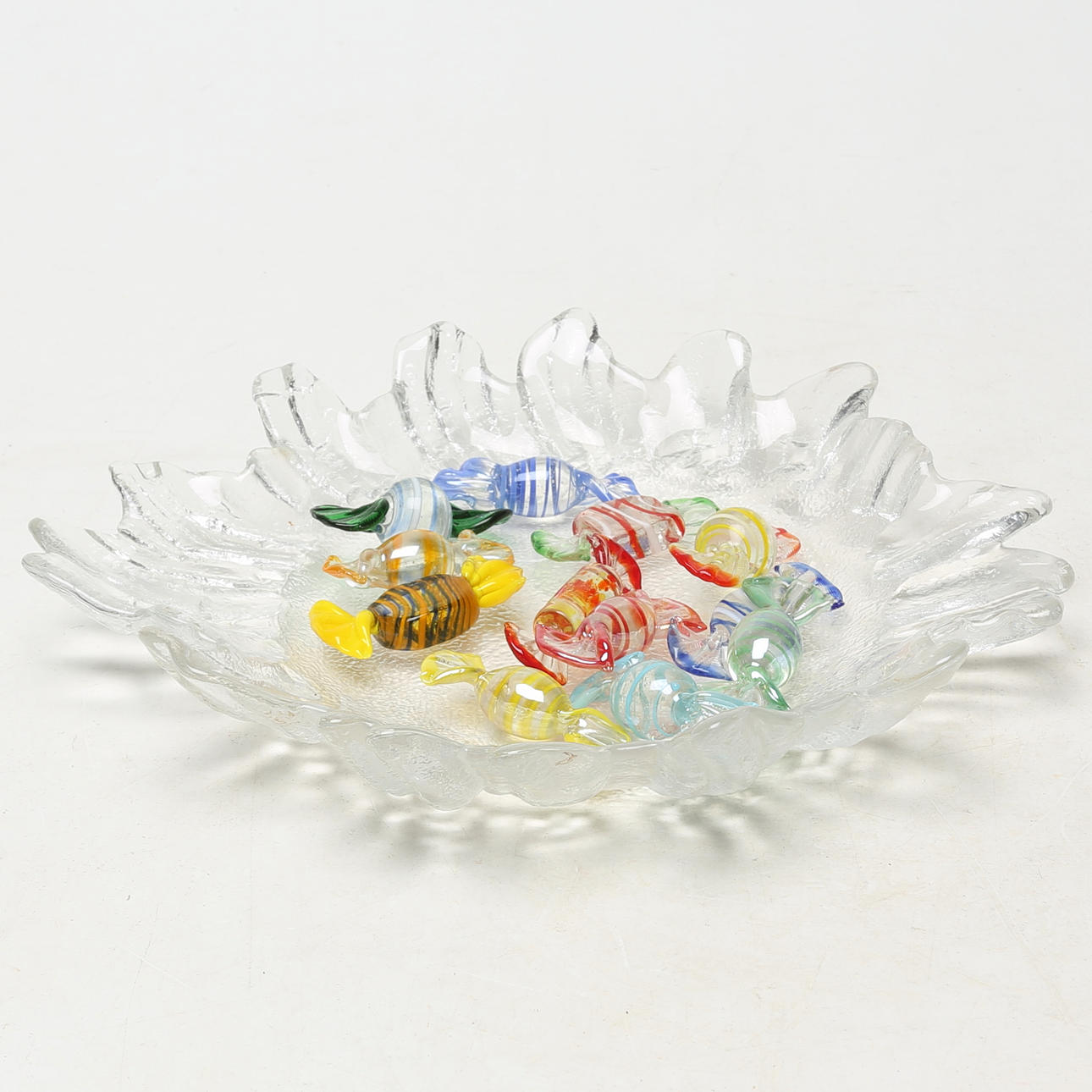 CANDY PIECES, 12 pcs, on a glass dish.