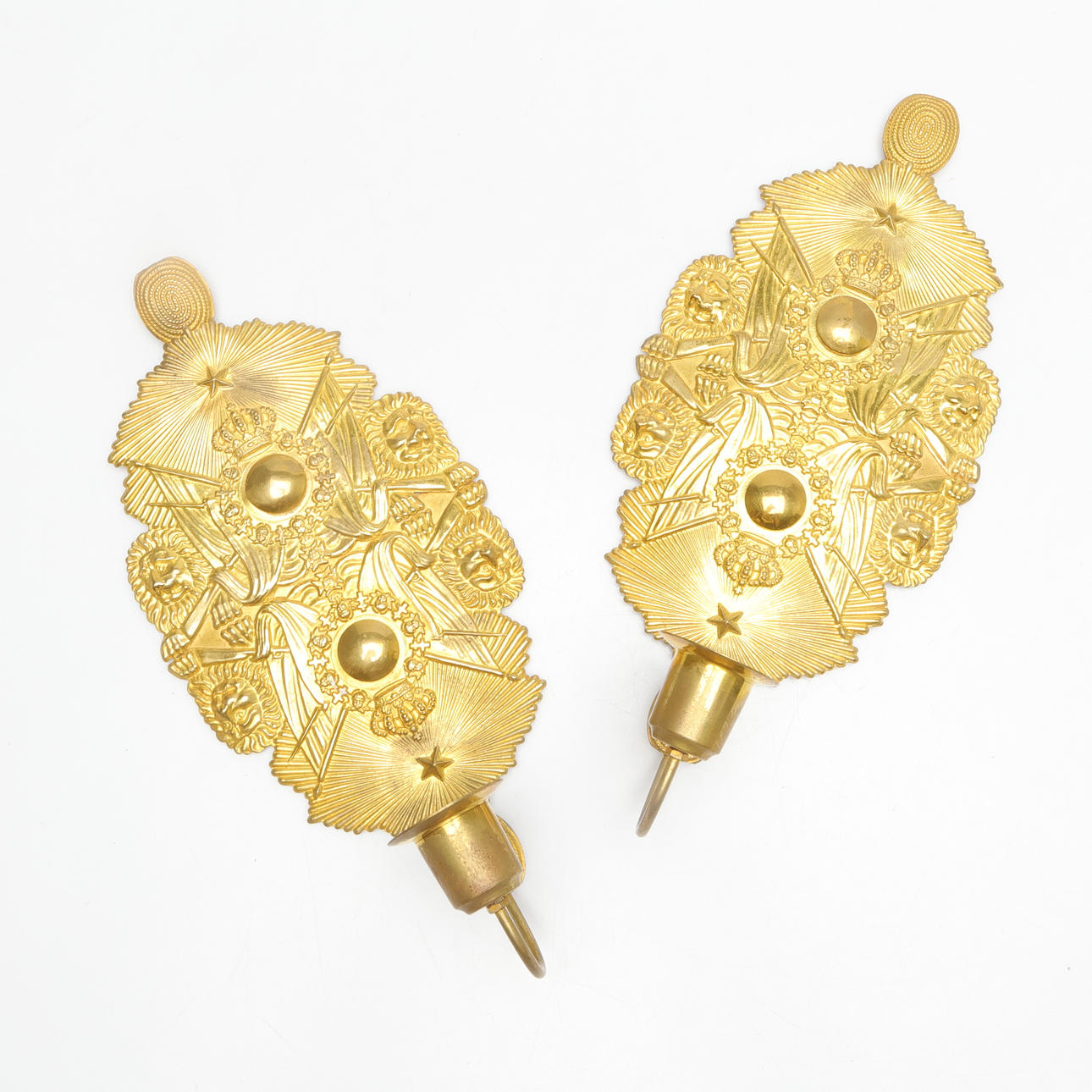 A pair of brass candlesticks, circa 1900.