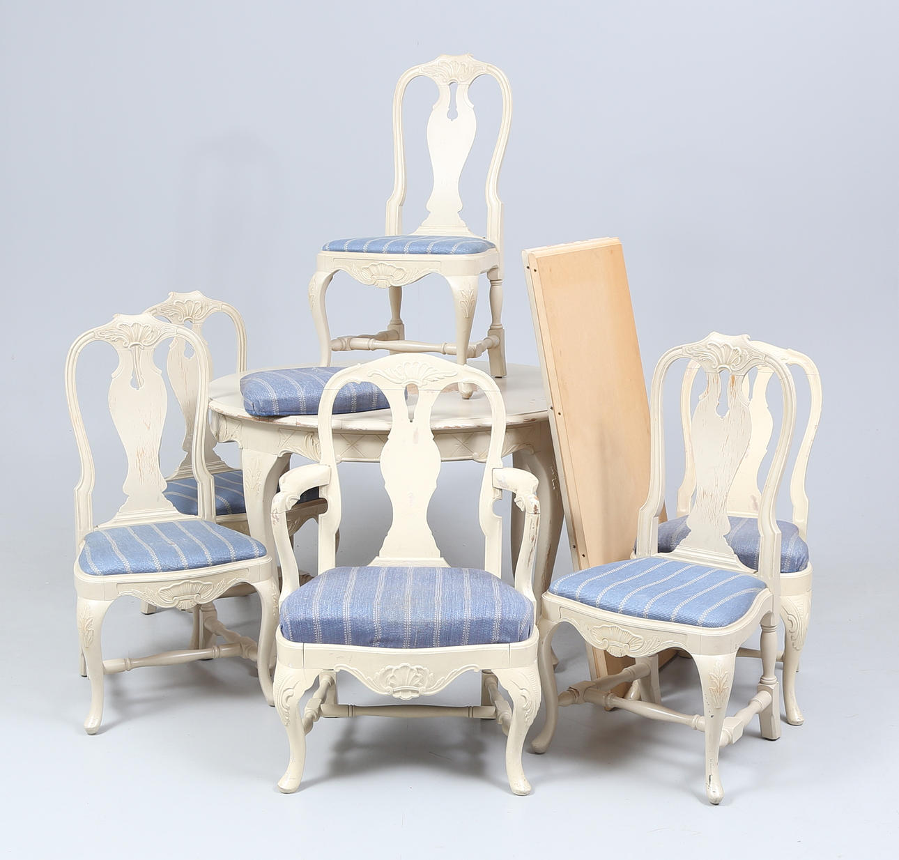 A rococo style dining group, 7 pieces, 20th century.