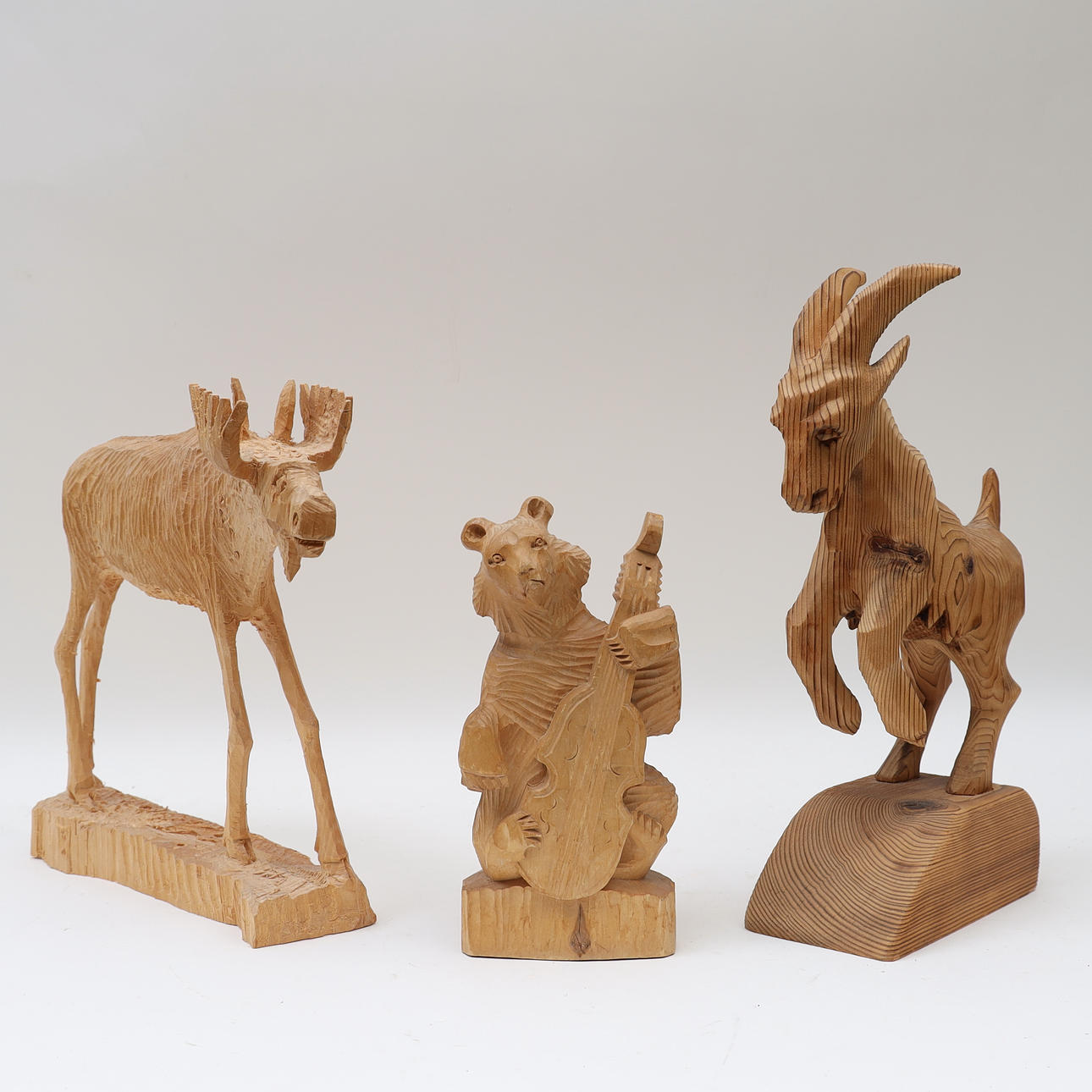 WOODEN FIGURES, 3 pieces.