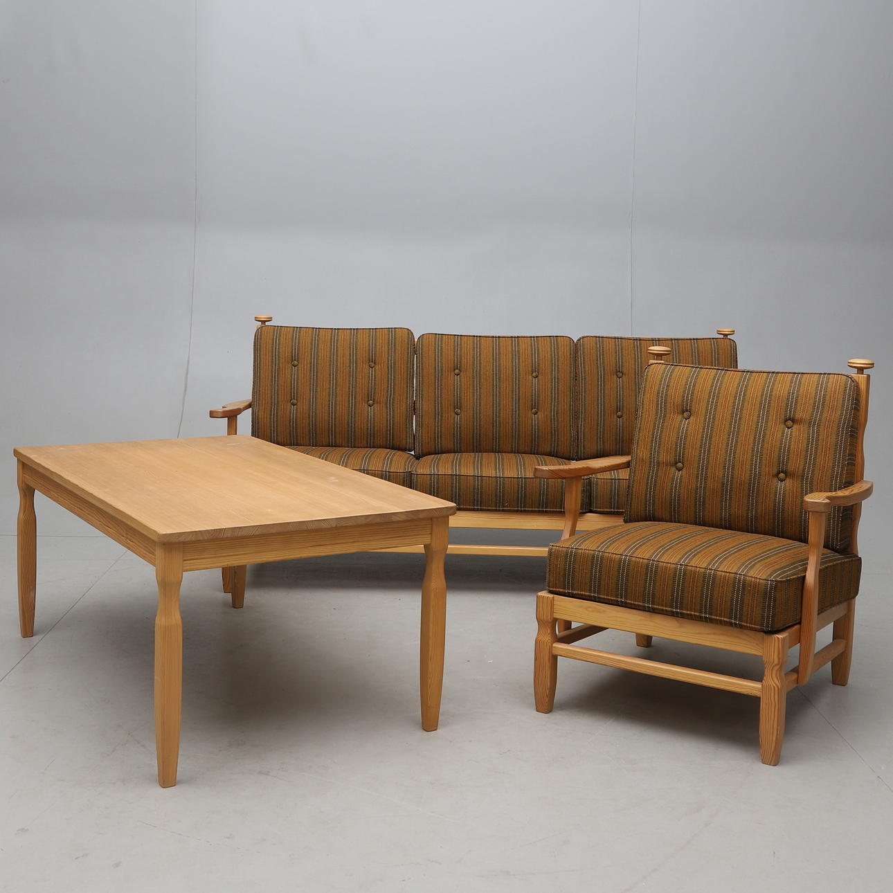 A 3-piece pine sofa group from the 1970s.