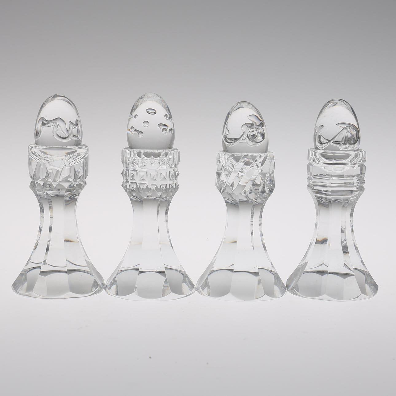 SKULPTURER, 4 stycken,"Livets ägg", Olle Alberius Fyrklövern, Orrefors.