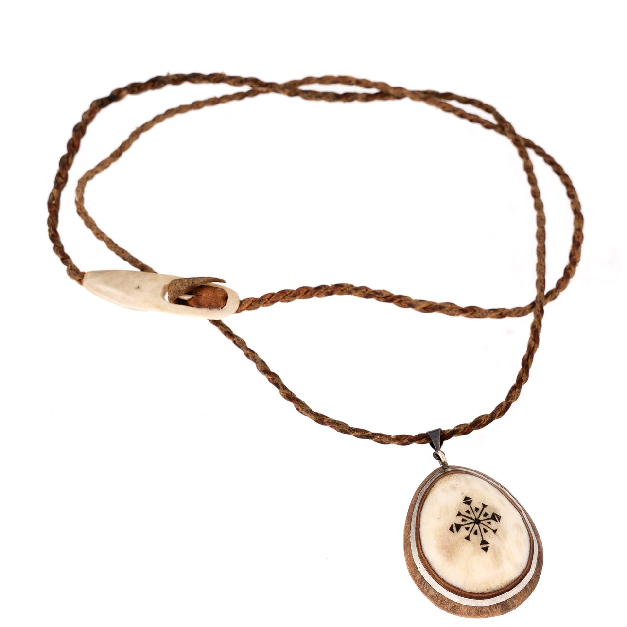 LARS PIRAK. Pendant, Sámi veiled.