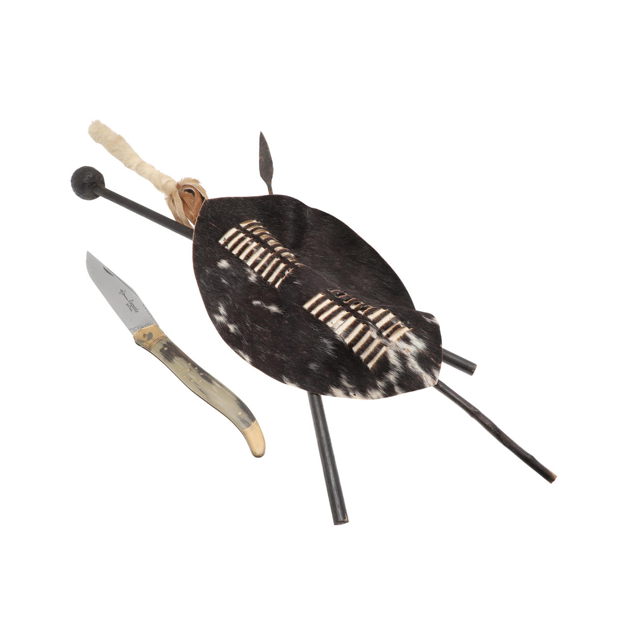 A ZULU STLE SHIELD AND SPEARS WALLMOUNTING DISPLAY.