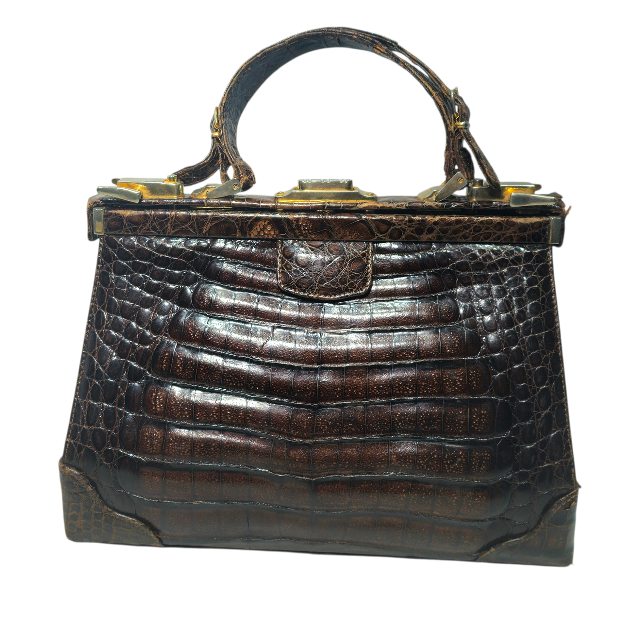 Brown crocodile leather bag with short handle.