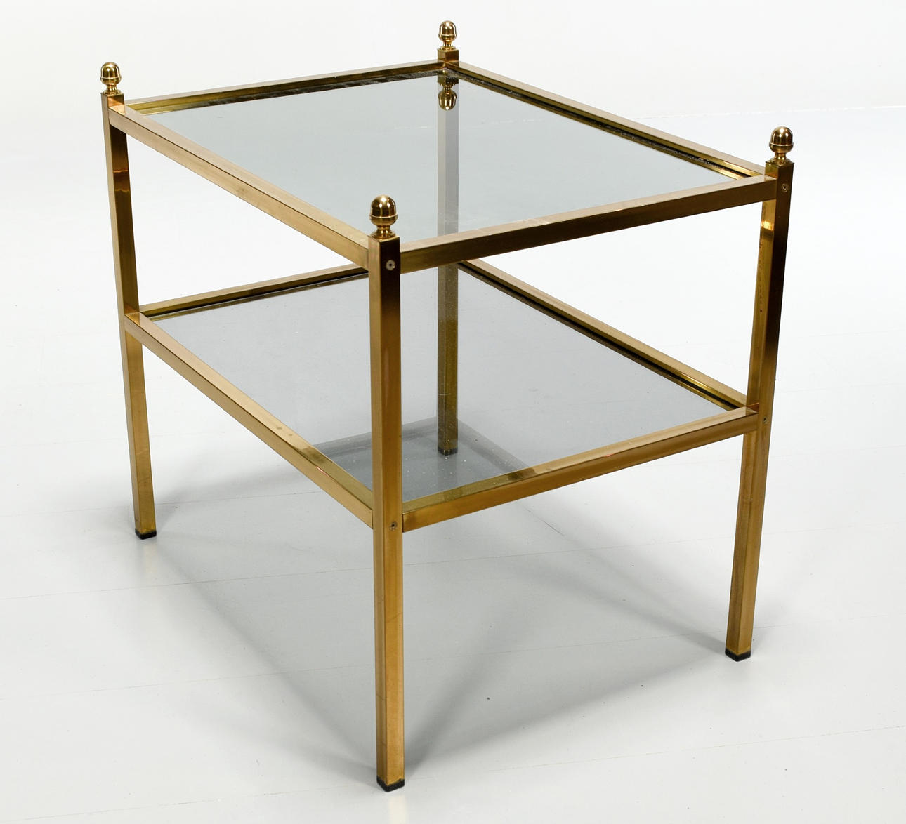 A side table, glass and brass, 20th century.