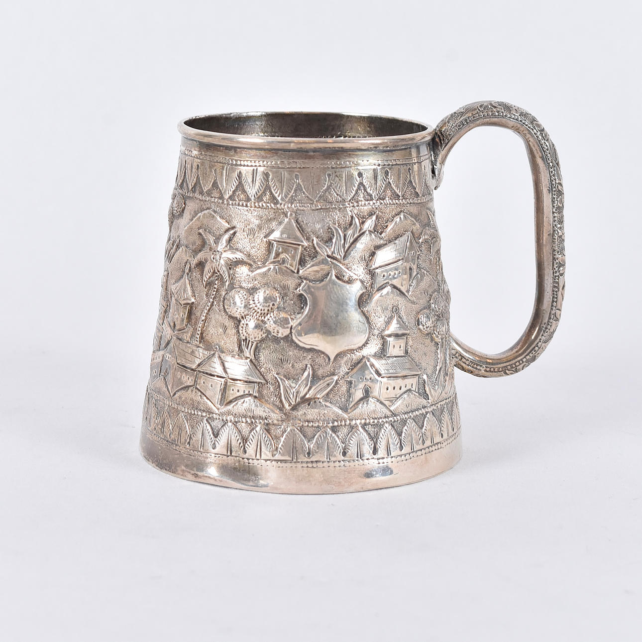 A silver mug, India, 20th century.