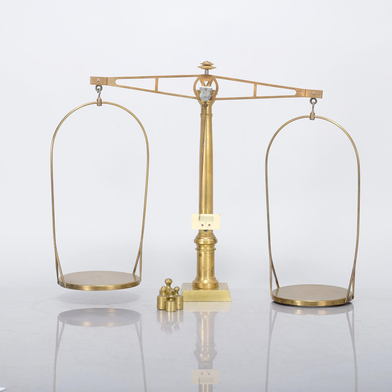 A 20th-century brass APOTEKSVÅG.