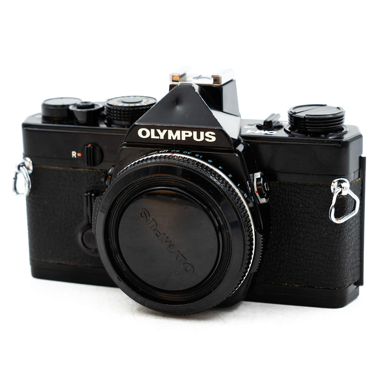 A camera, Olympus OM-1, Japan, 1970s.