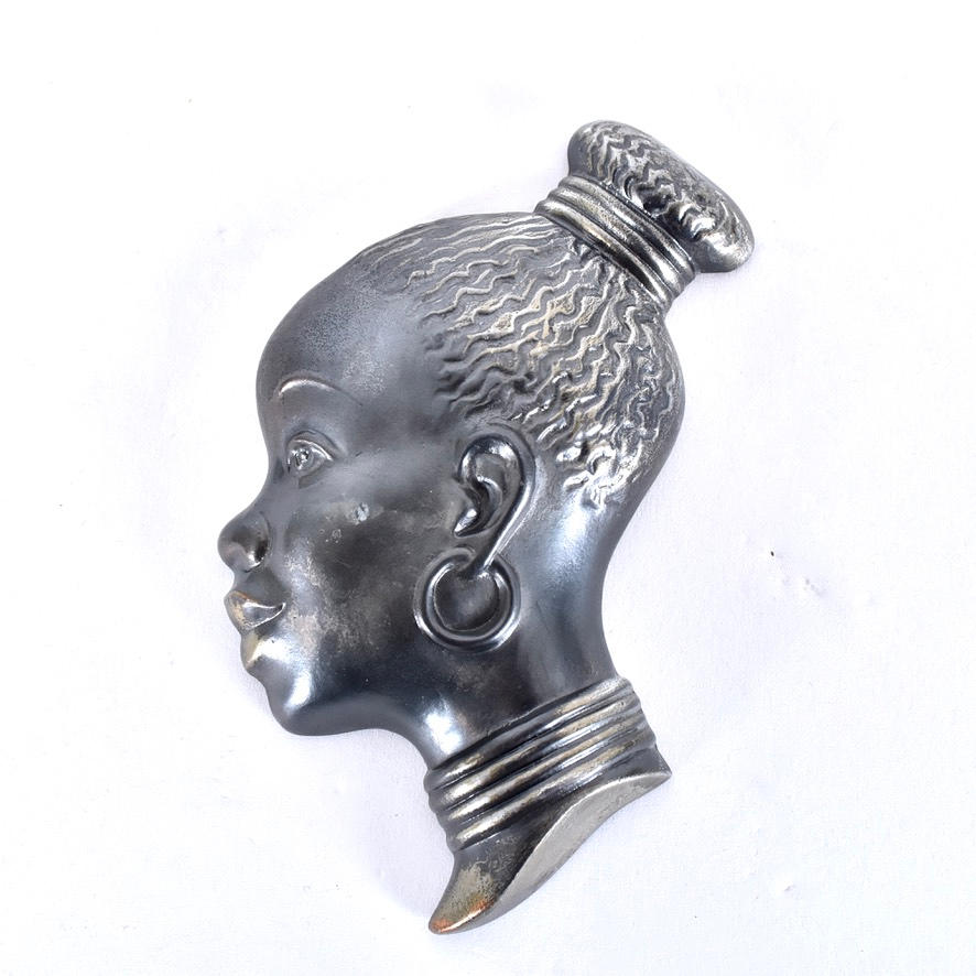 RELIEF, patinated metal, Leco, Denmark.