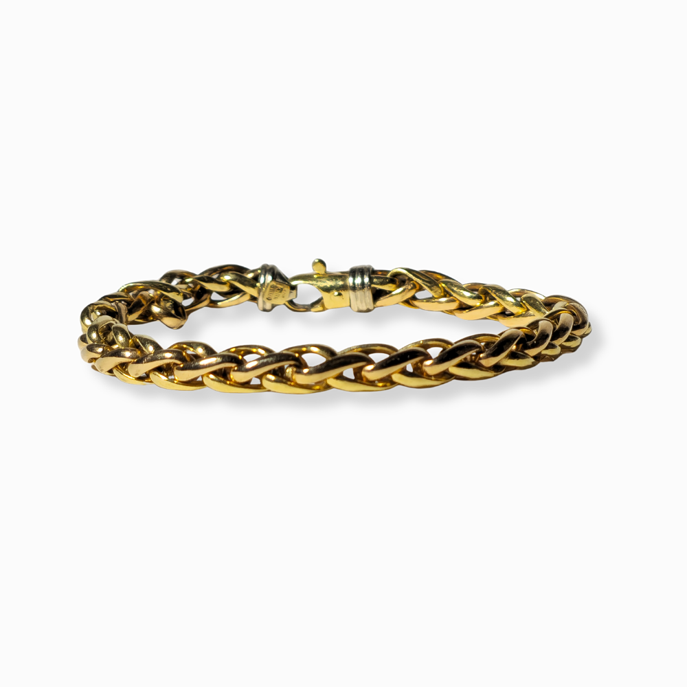 18 CARAT GOLD LINK BRACELET.