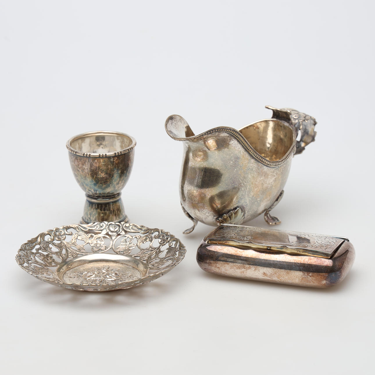 SILVER OBJECTS, 4 pieces, weight approx. 306 grams.