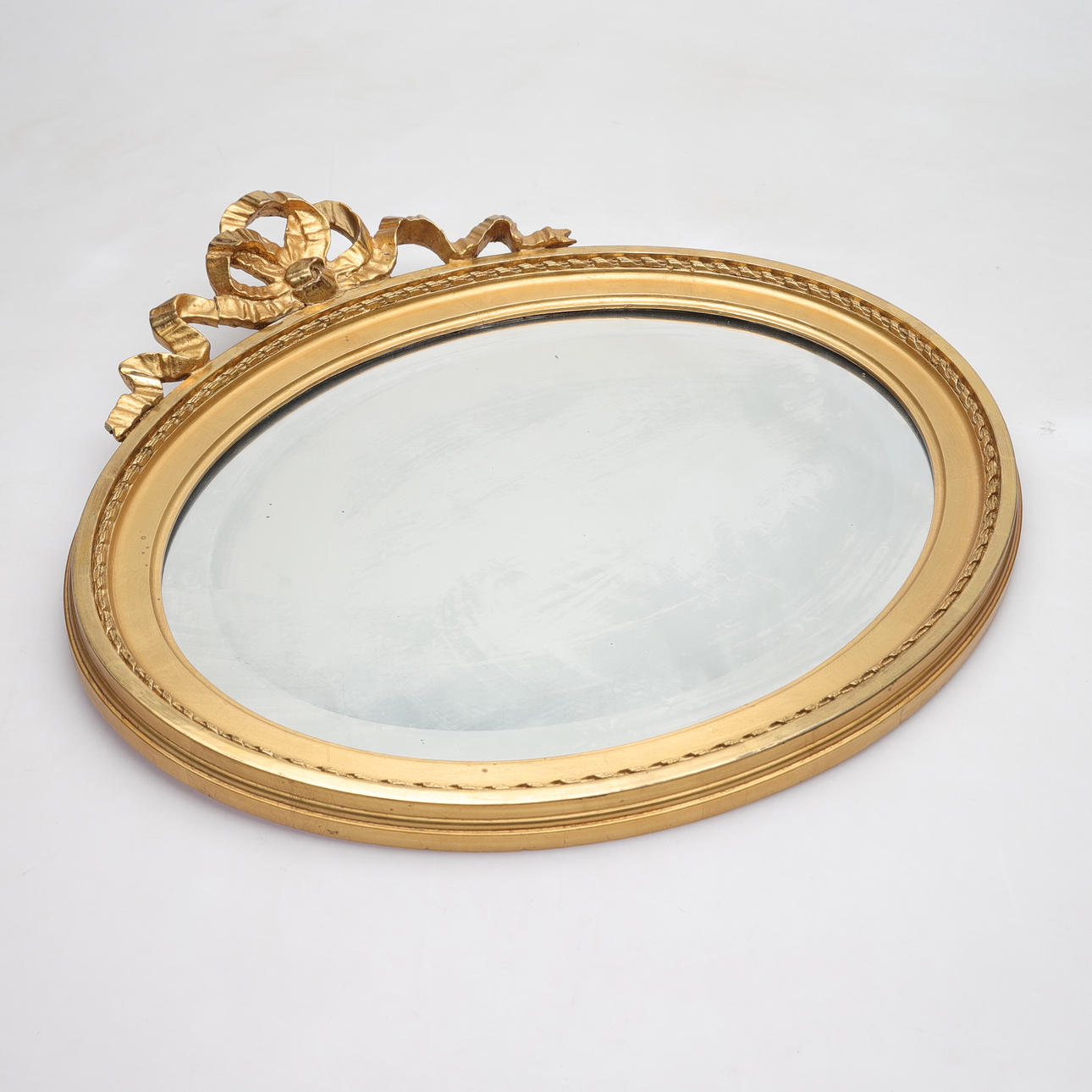 A Gustavian-style mirror, 20th century.