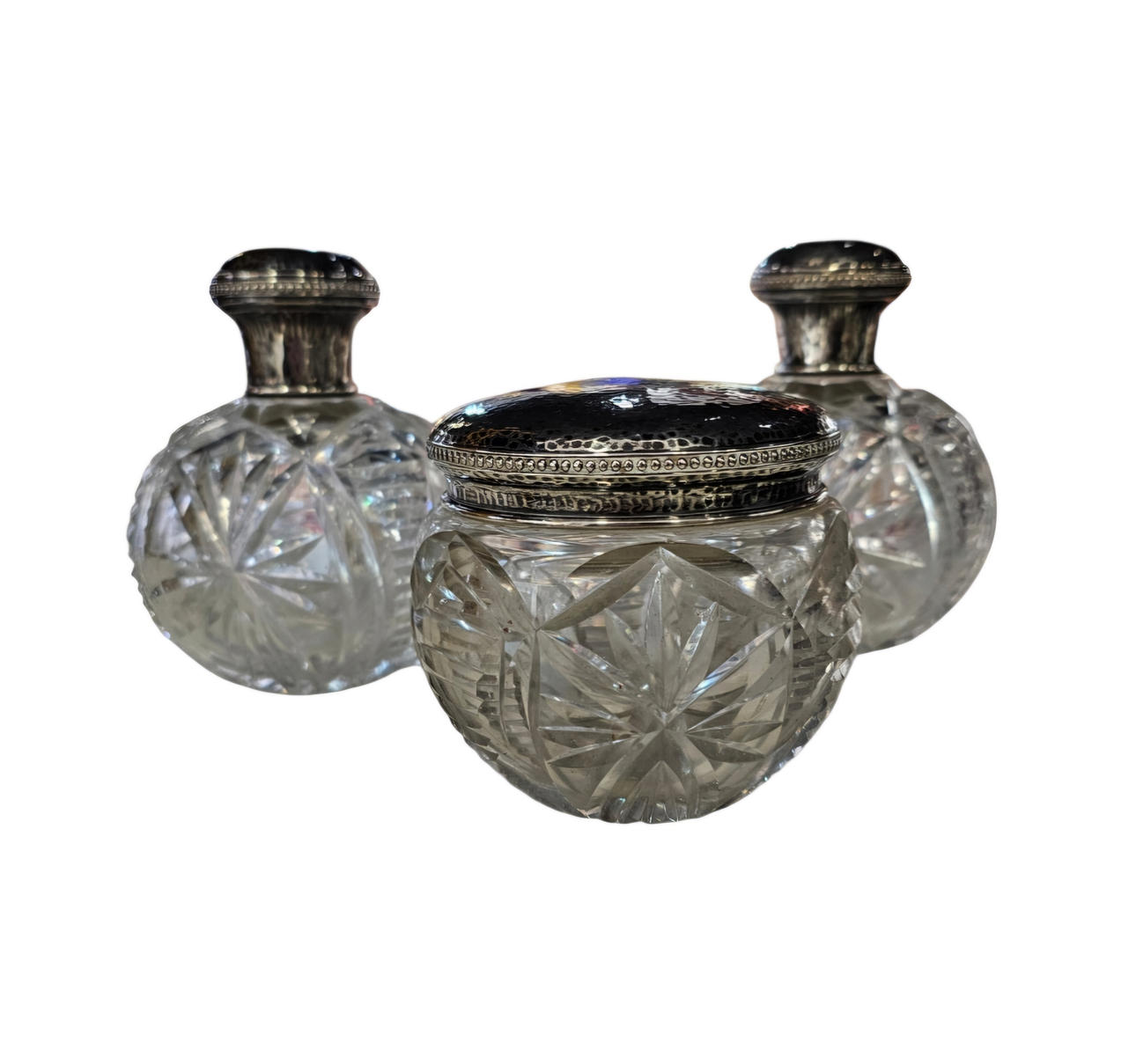 Vanity set with two perfumers and a hammered silver powder.