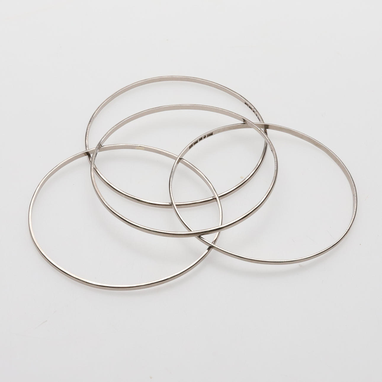 ALF HALLDIN. Armringar, 4 st, 18K vitguld.