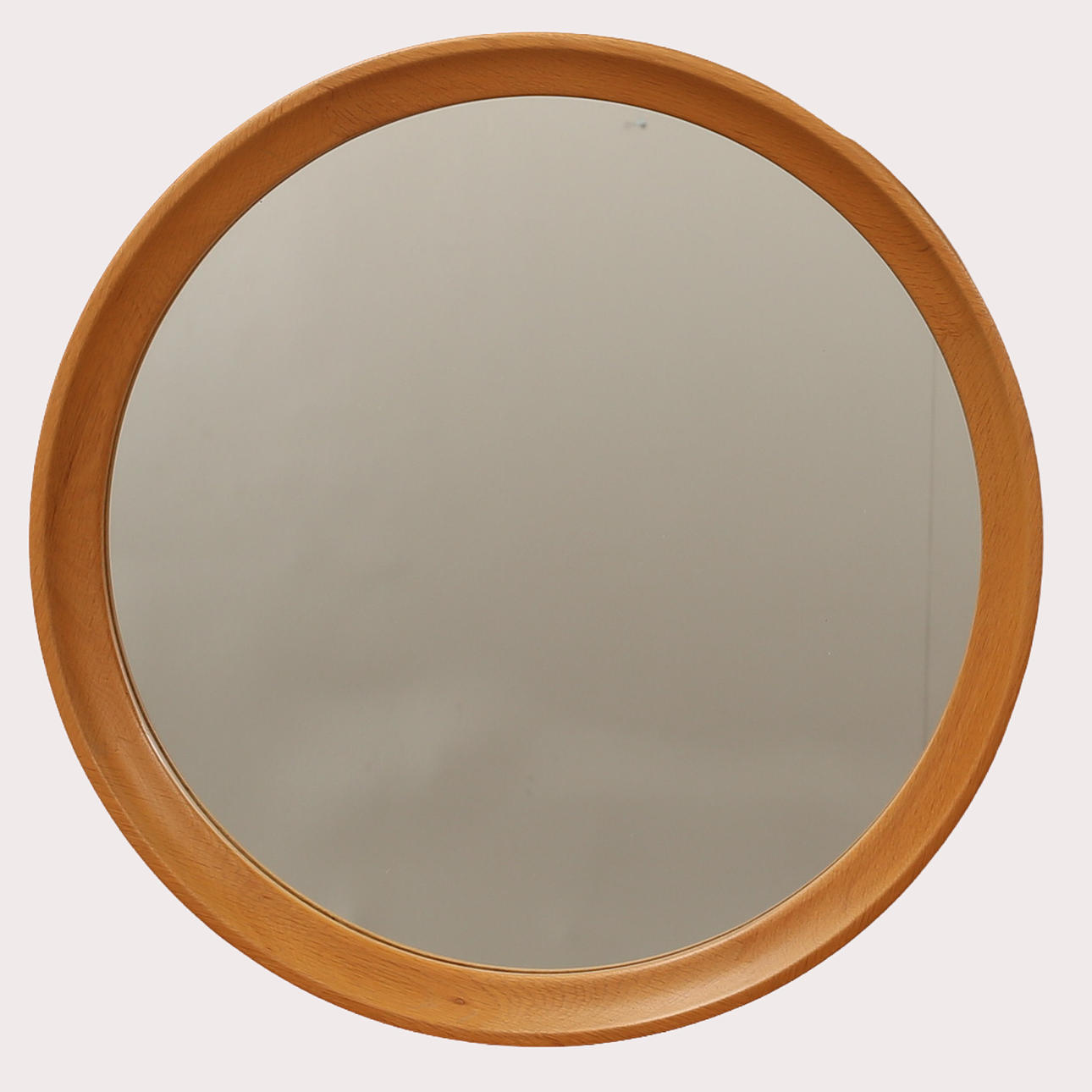 A mirror, round, lacquered oak frame, 1970s.