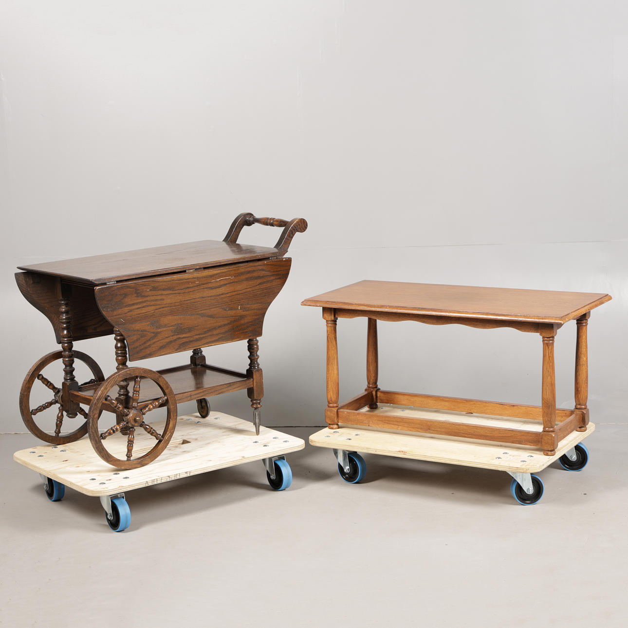 AN OAK COFFEE TABLE AND A TEA TROLLEY (2).