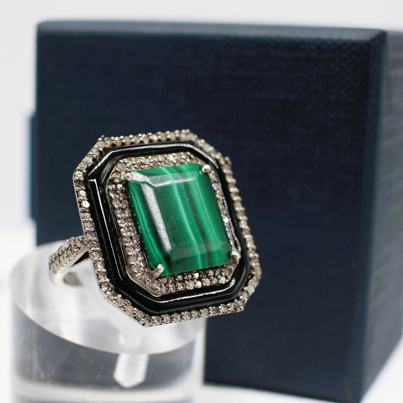 MALACHITE, ONYX & DIAMOND RING.