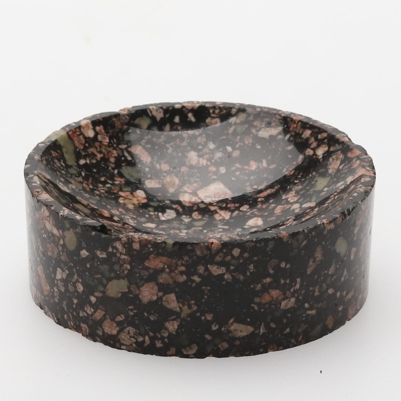 A 19th century porphyry salt vessel.