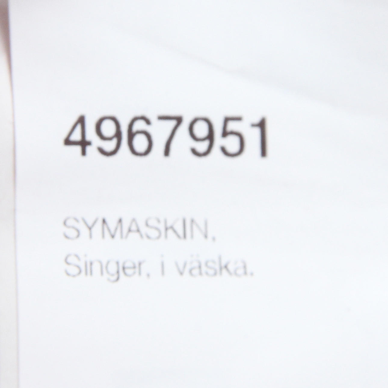 SYMASKIN, Singer, i väska.
