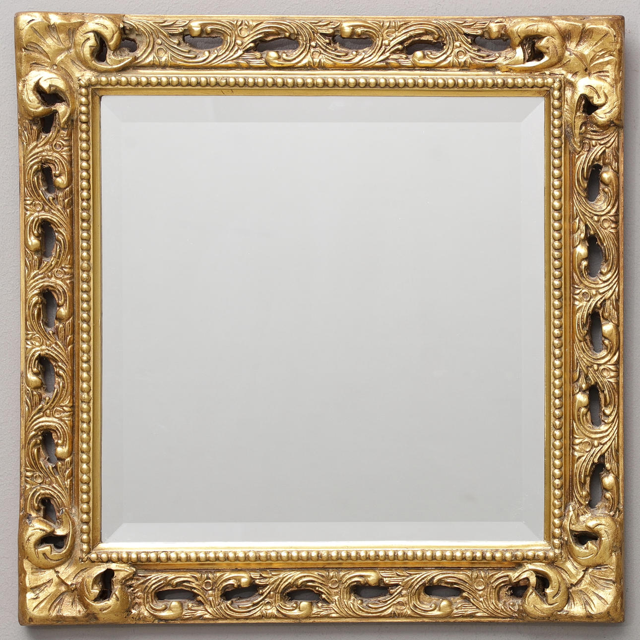 A mirror, cut glass, mid 20th century.