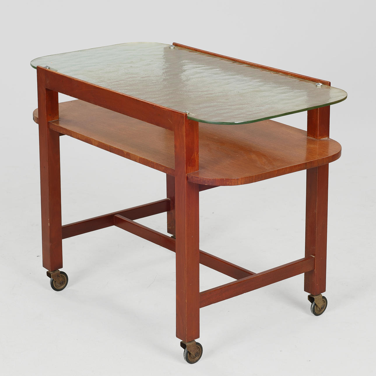 Mahogany and glass roller table, Denmark, circa 1930s.