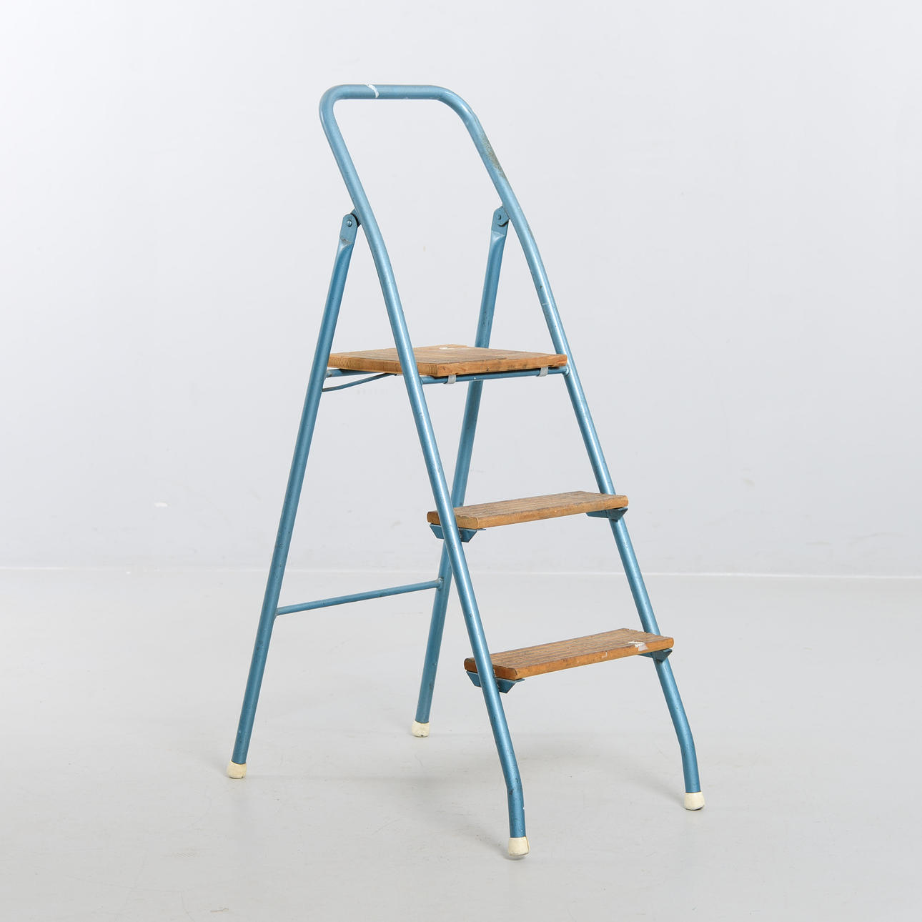 A mid-20th century ladder.