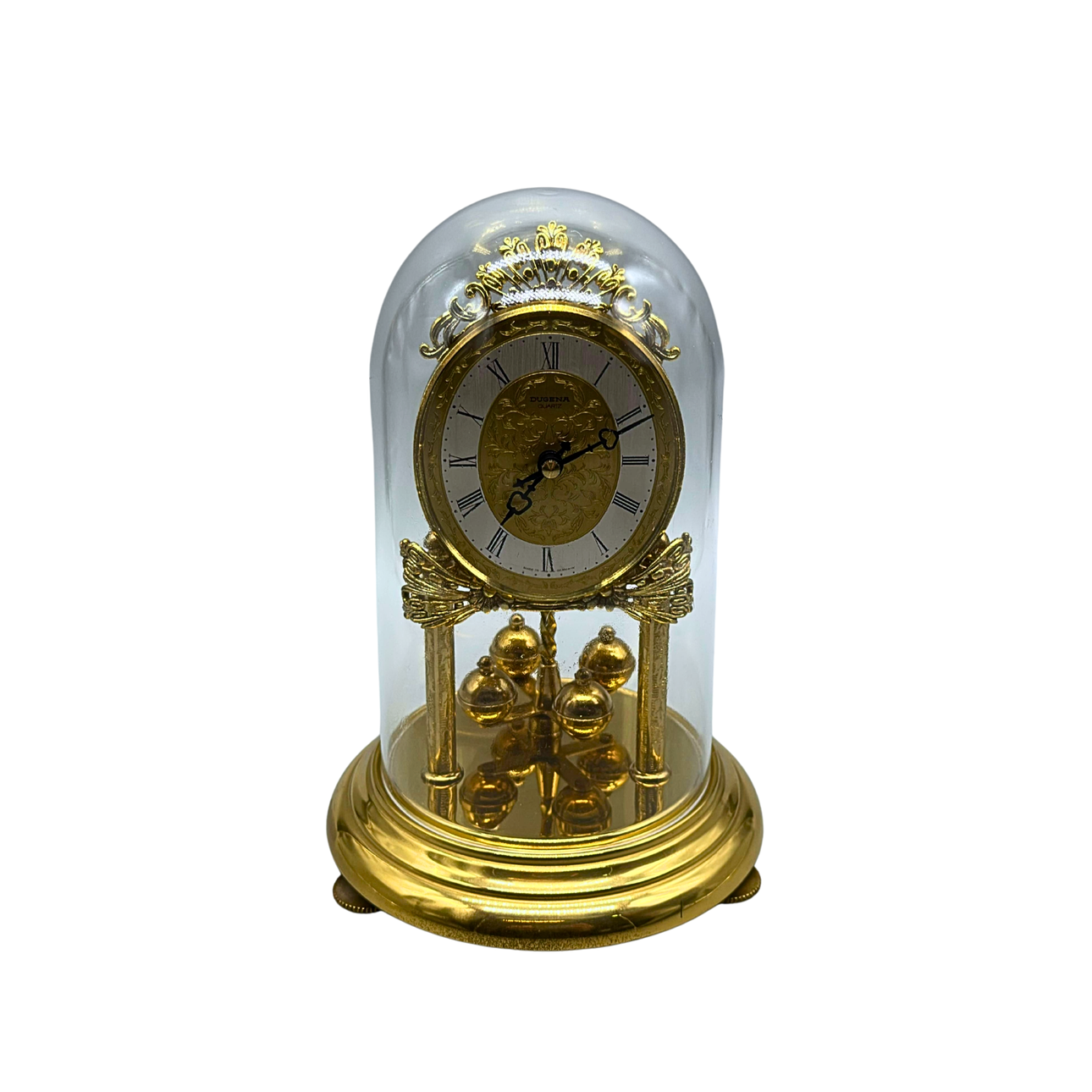 DUGENA QUARTZ CLOCK WITH ROTATING PENDULUM.