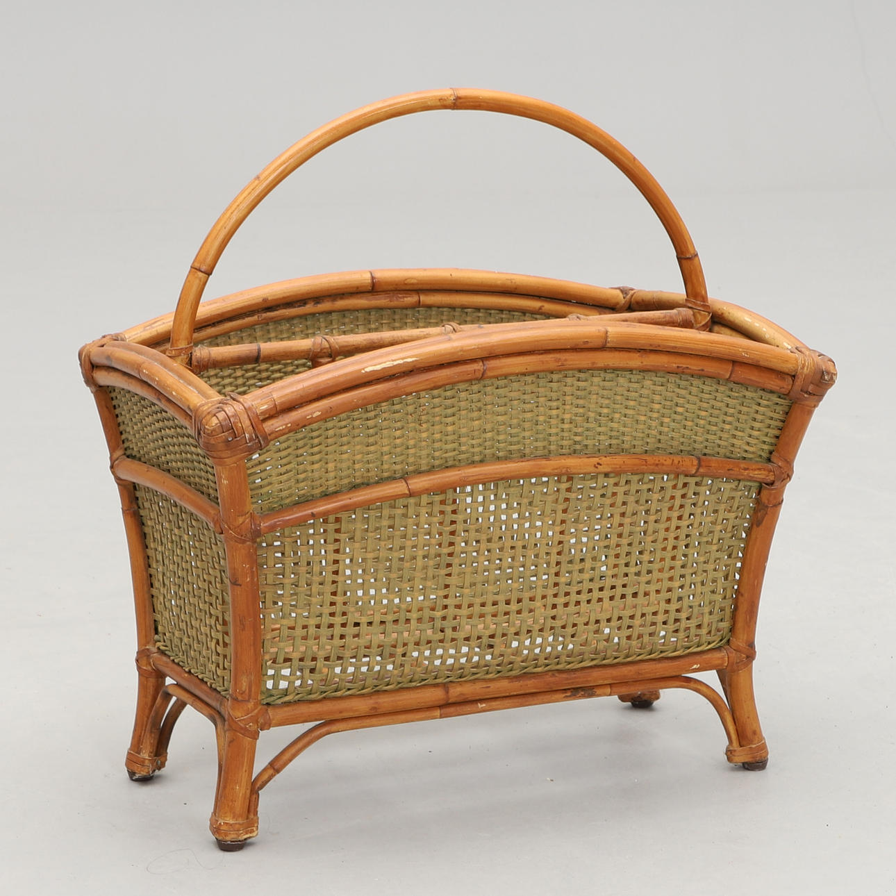 A late 20th century magazine rack.