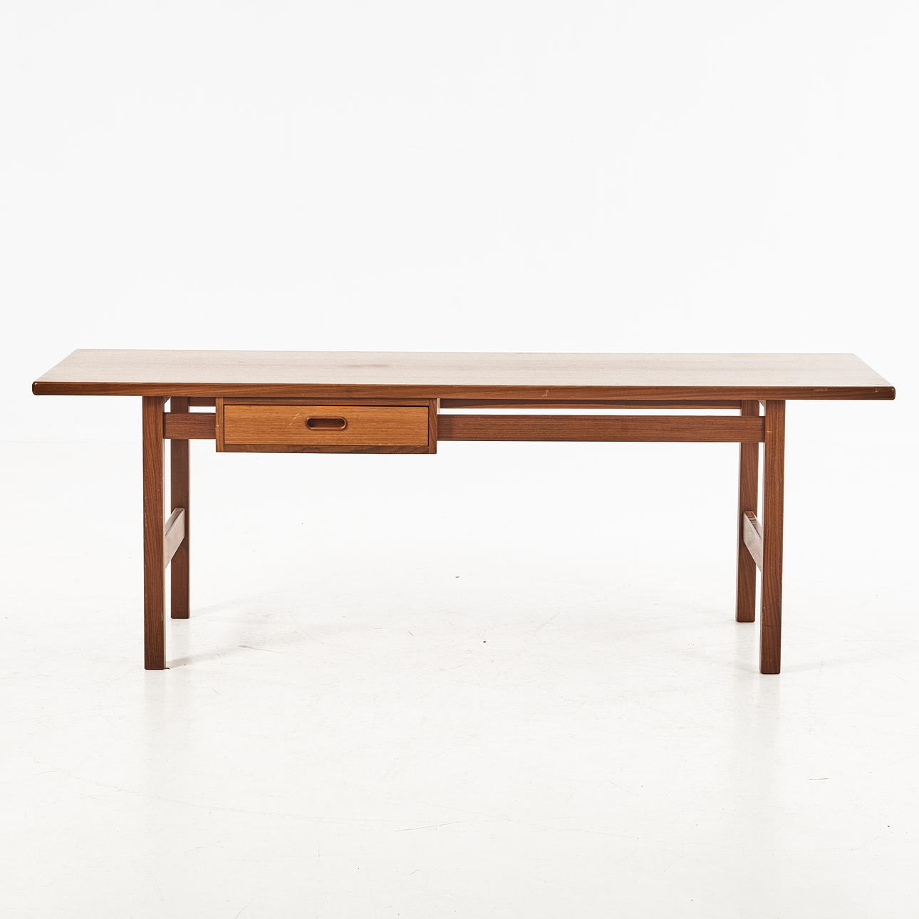 A Swedish 1960s coffee table, solid teak, box under the top.