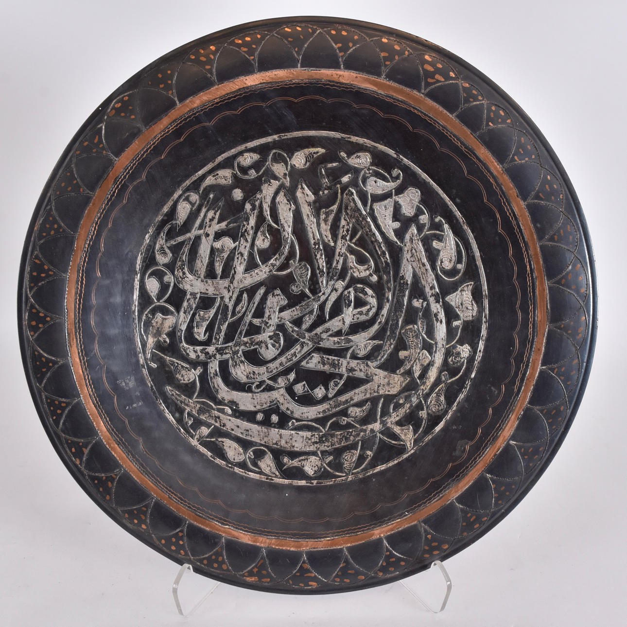 FAT, patinated copper with silver intarsia.