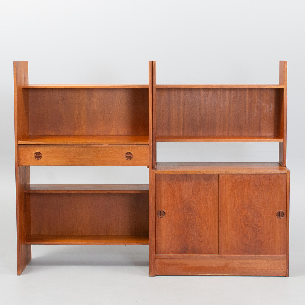 Sideboard with modular shelving in teak. Denmark, 1970s.