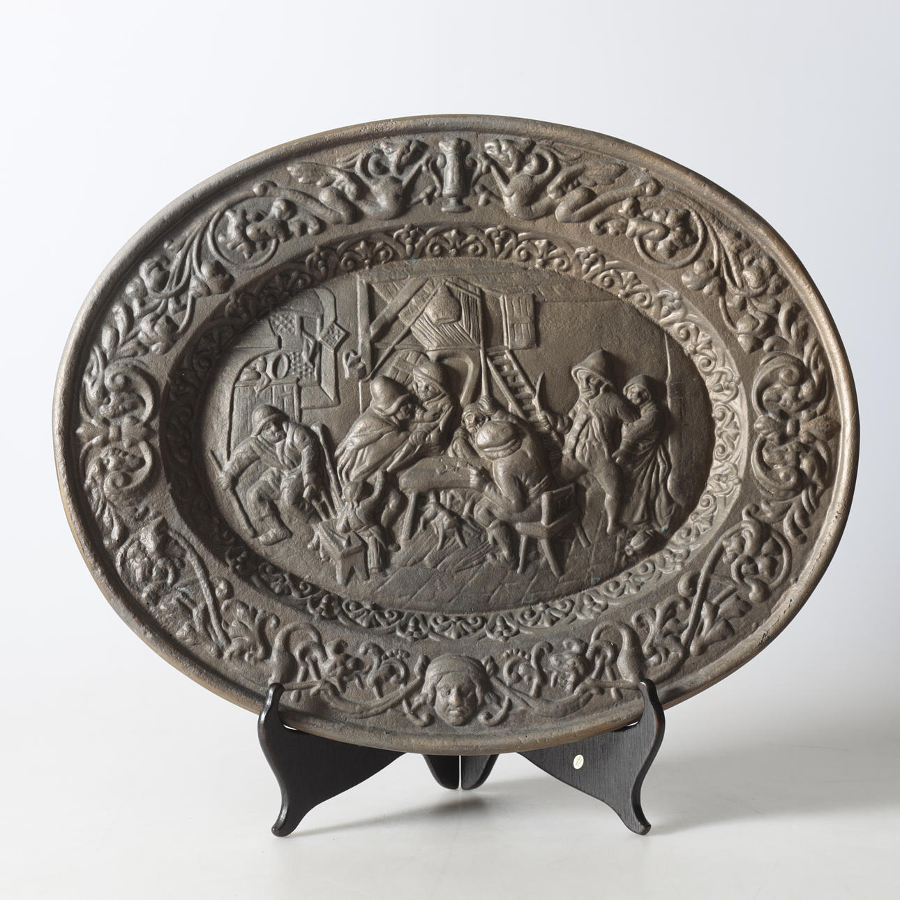 A decorative shield, cast iron, 20th century.