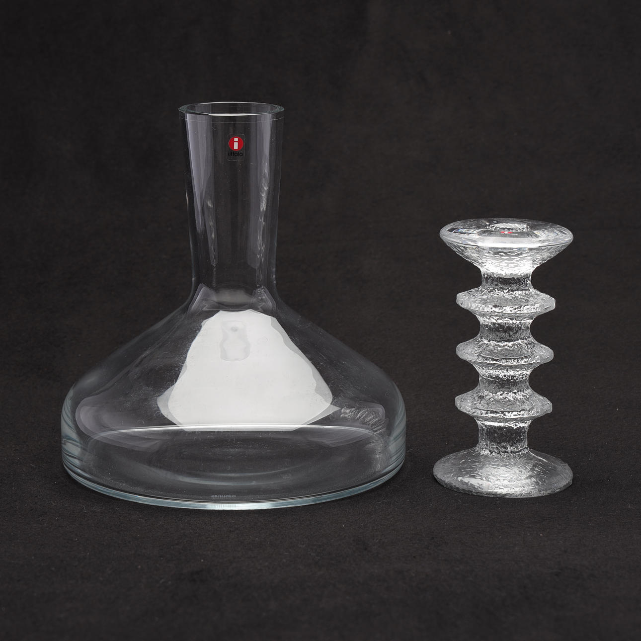 A glass decanter and candlestick, Iittala.