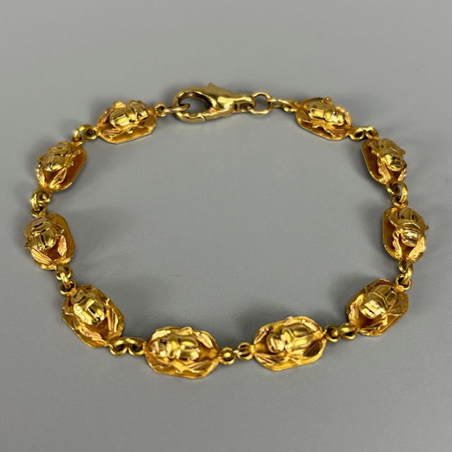 EGYPTIAN GOLD METAL BRACELET.