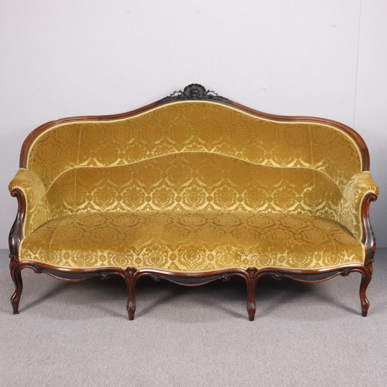 A 20th century Rococo sofa.