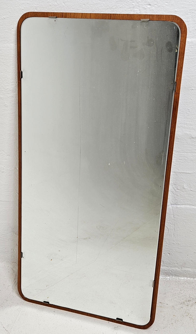 A 1950s/60s teak mirror.