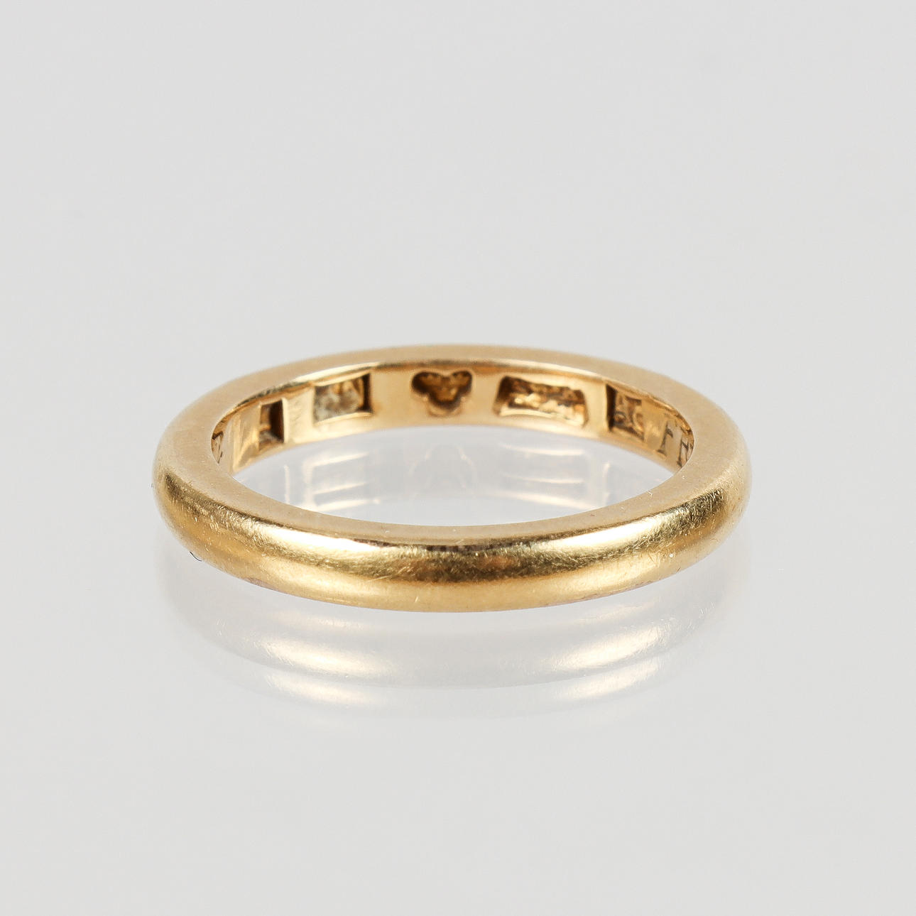 RING 23k gold.