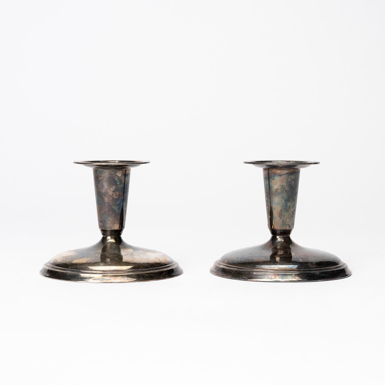 A pair of silver candlesticks, GAB, 1963.