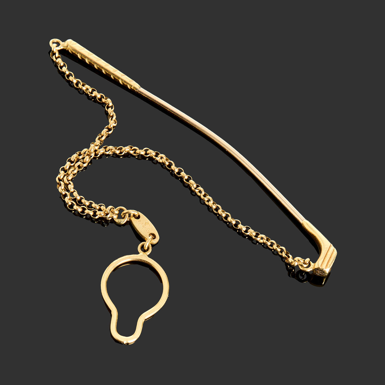 TIE HOLDER, 18k gold.