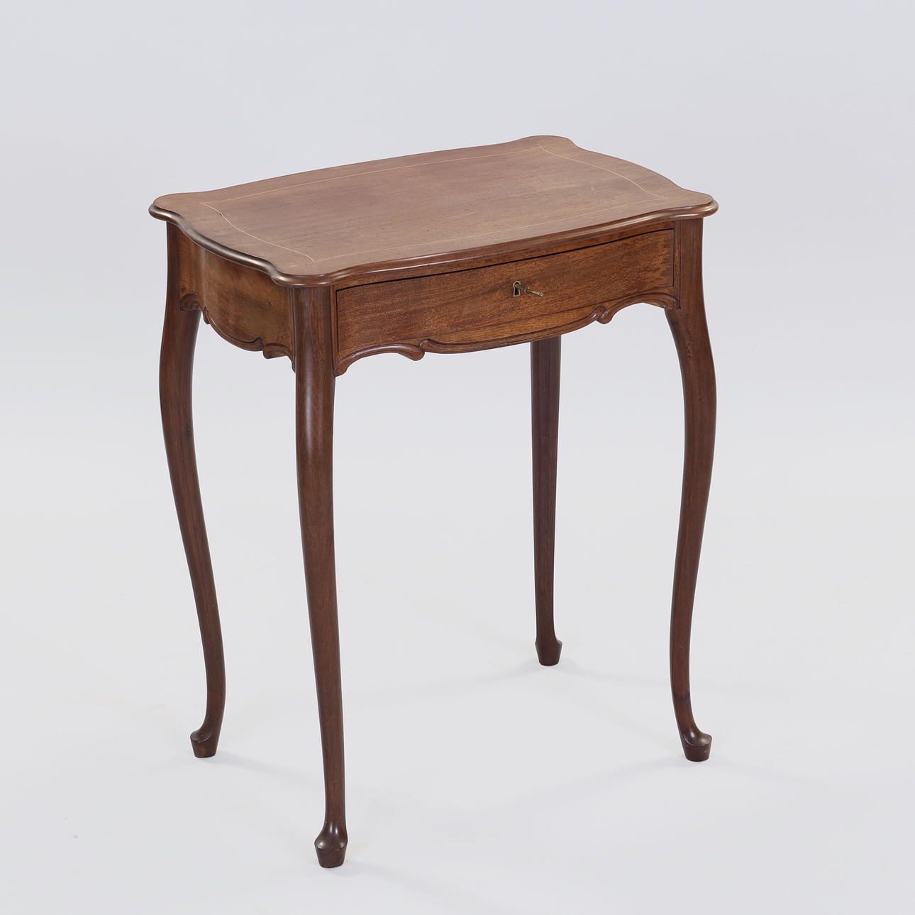 Mahogany sewing table with drawer, circa 1900.