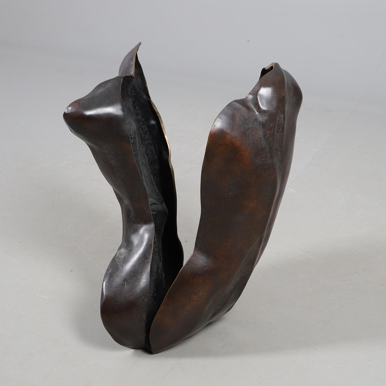EVA DREWETT (B 1957). BRONZE 'SPLIT TORSO' SCULPTURE.
