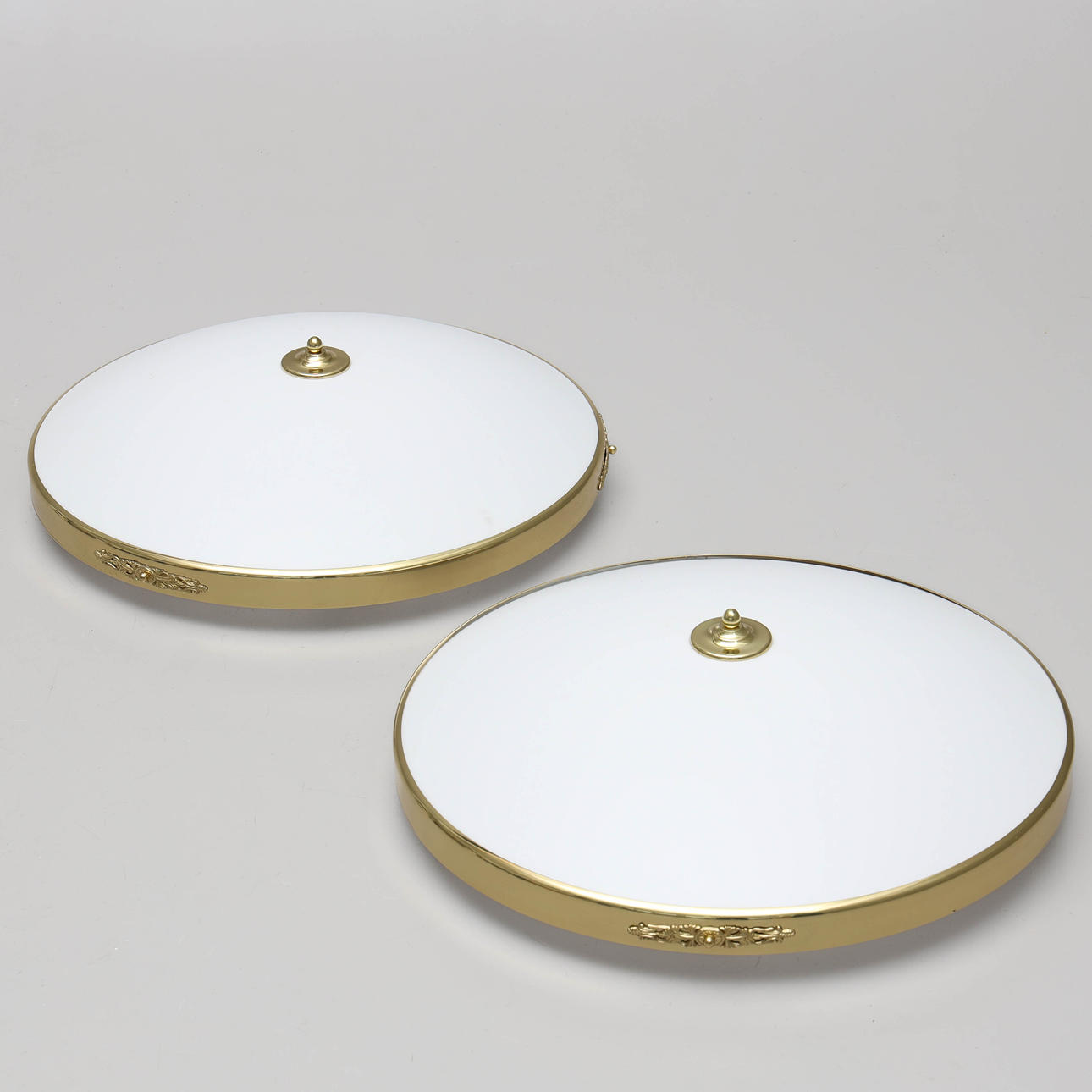 Two metal & plastic plafonds, 20th century.