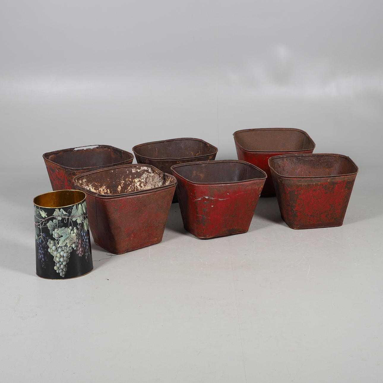 SEVEN TOLEWARE BASKETS/ PLANTERS.