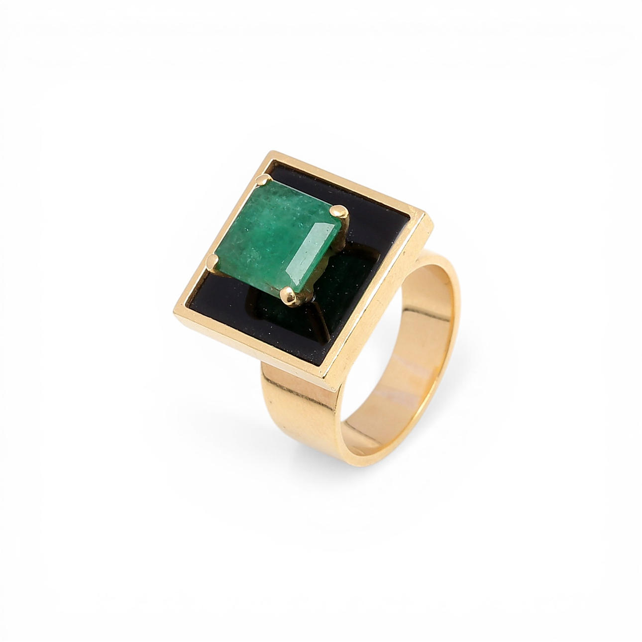 Gold, emerald and onyx ring.
